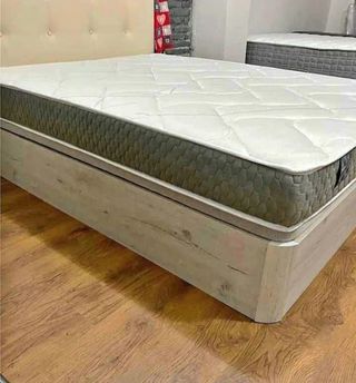 Canapé cama gris con cabecero