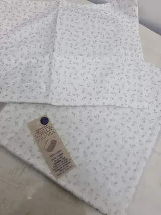 Juego sábanas moisés flores gris