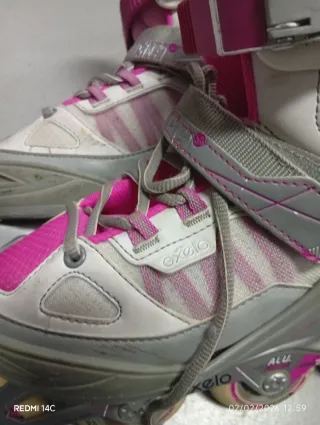 Patines en línea rosas y blancos