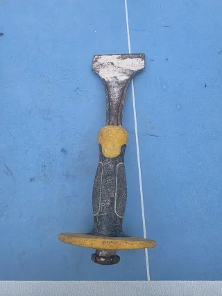 Herramientas de albañil y cadena