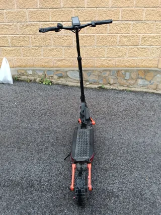 Patinete Eléctrico Naranja y Negro