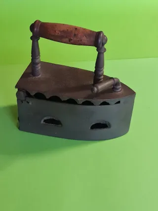 Antigua plancha de carbón