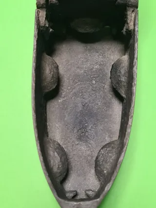 Antigua plancha de carbón