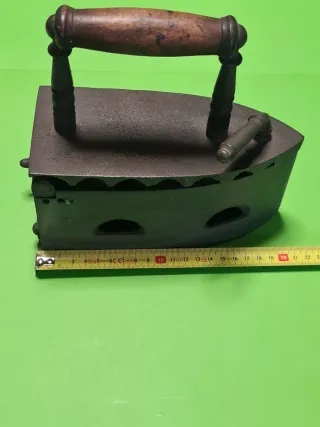 Antigua plancha de carbón