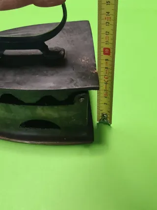 Antigua plancha de carbón