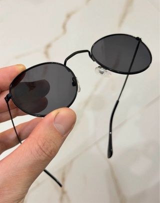 Occhiali da sole rotondi neri