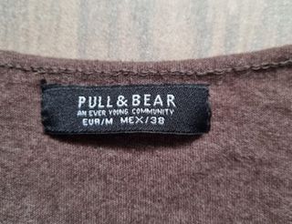 Camiseta azul, rojo y marrón de chico