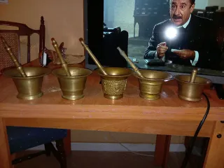 9 morteros antiguos de latón