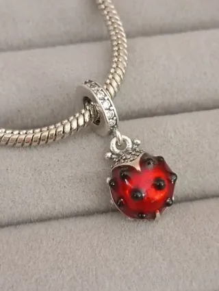 Charm mariquita nuevo plata