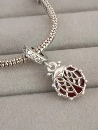 Charm mariquita nuevo plata