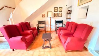 Sillón rosa de tela