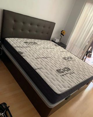 Canapé cama gris con cabecero