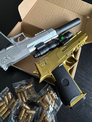 Pistolas de juguete y munición