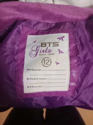 Chaleco morado de niña