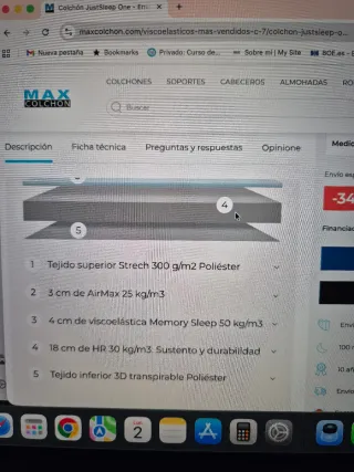 Colchón con base tapizada y 6 patas  metálicas.