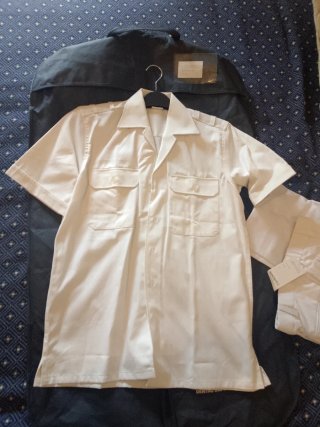 Lote 2 Uniformes verde y blanco.