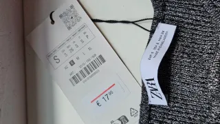 Top brillante manga larga gris plata