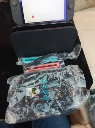 Nintendo Switch + 7 Juegos + maletín transporte