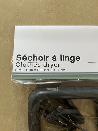 Stendino grigio con mollette