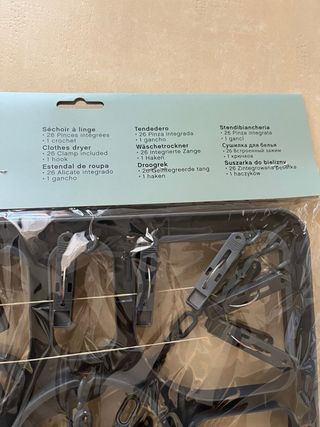 Stendino grigio con mollette