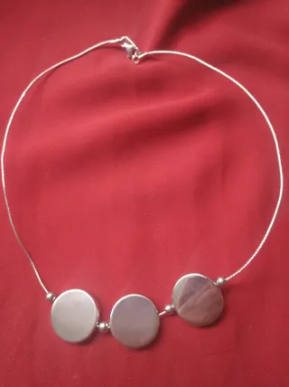 Collar de plata con discos
