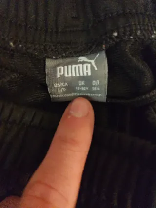 Conjunto deportivo negro y verde