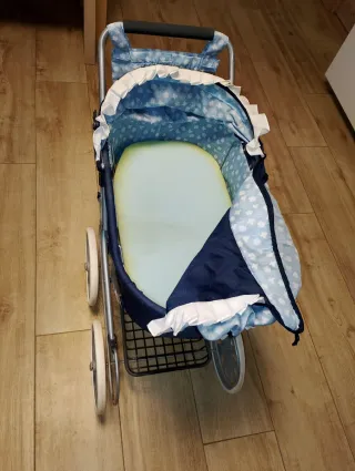 Cochecito de muñecas