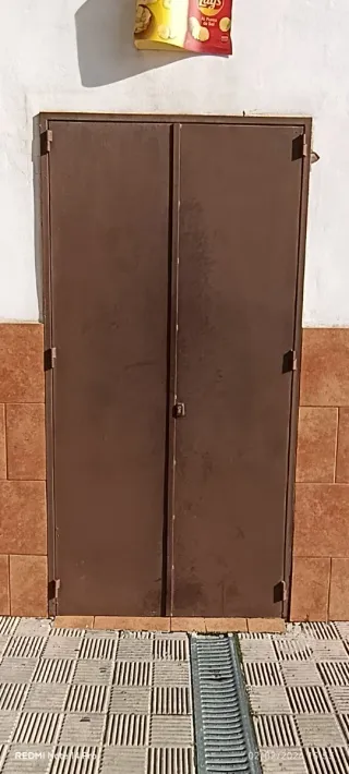 Puerta de hierro doble