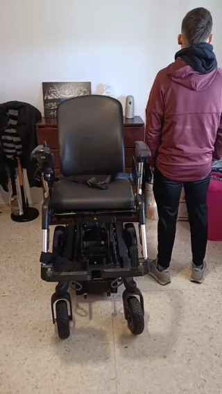 Silla de ruedas y grua de traslado