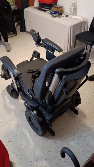 Silla de ruedas y grua de traslado