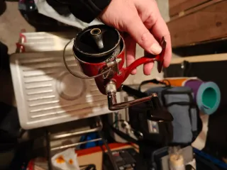 Carrete de pesca Herculy No. 99 y sagarra.