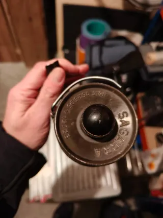 Carrete de pesca Herculy No. 99 y sagarra.