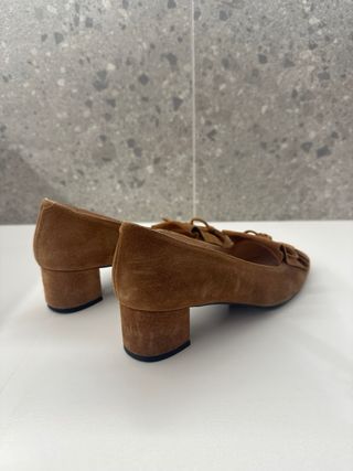 Mocasines de piel con flecos