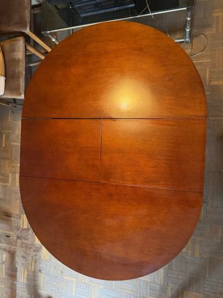 Mesa redonda de madera con 4 sillas