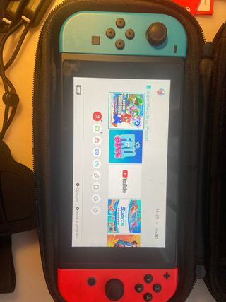 Nintendo Switch sport Blu/Rosso + Accessori