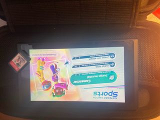 Nintendo Switch sport Blu/Rosso + Accessori