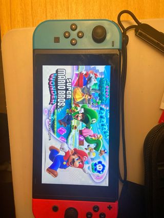 Nintendo Switch sport Blu/Rosso + Accessori