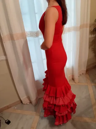 Traje de flamenca rojo con volantes