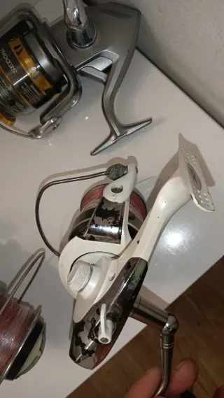 Carretes de pesca Shimano y Grauvell y Cañas