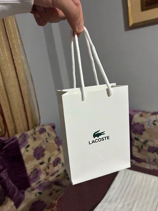 Pulsera Lacoste Plata y Negra Caja,bolsa y pulsera