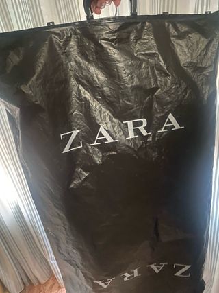 Conjunto de traje azul y blanco