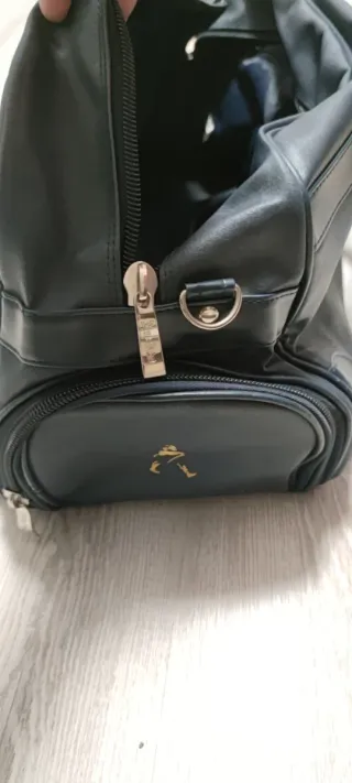 Bolso de viaje Johnnie Walker azul y dorado
