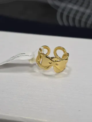 Anello fiocco oro regolabile