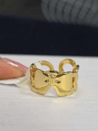 Anello fiocco oro regolabile