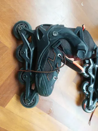 Patines (talle 35 - 38) en línea negros y naranjas
