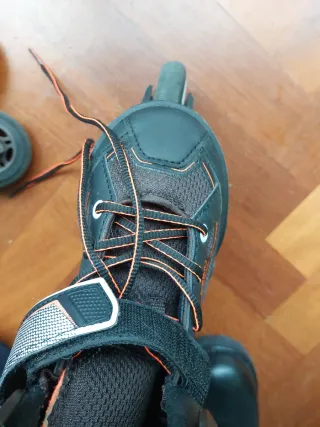Patines (talle 35 - 38) en línea negros y naranjas