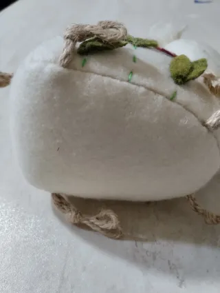 Pecorella peluche con campanellino