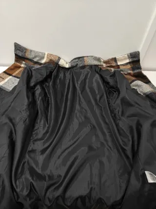 Abrigo de cuadros elegante