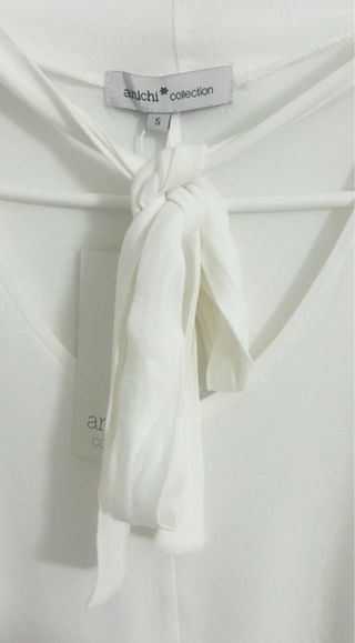 Talla S. Blusa elástica, manga larga AMICHI.