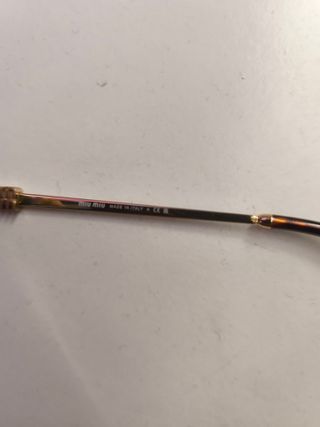 Gafas de sol Miu Miu doradas y verde oliva